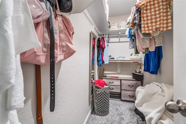 a storage room with washer and dryer