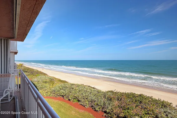 a view of an ocean from a balcony