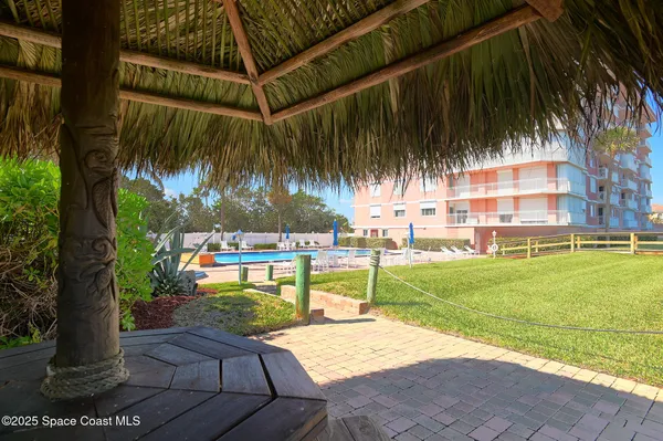 a view of swimming pool with an ocean view