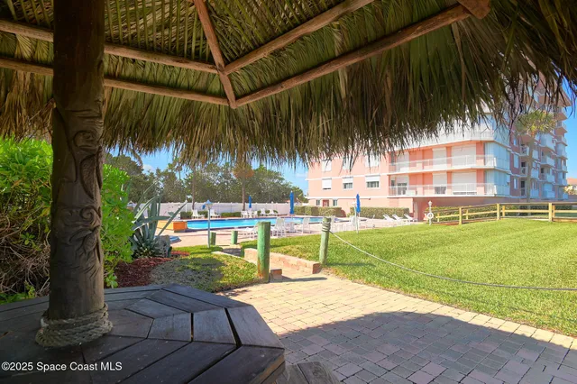 a view of swimming pool with an ocean view