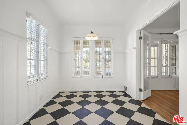 a workspace with furniture and window