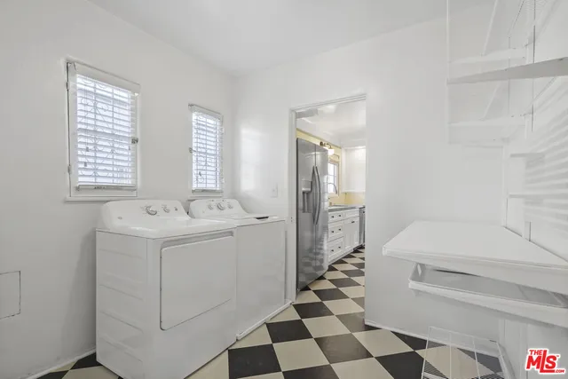 a bathroom with a sink a toilet and vanity