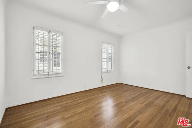 a bathroom with a tub and shower