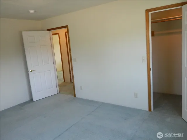 an empty room with closet