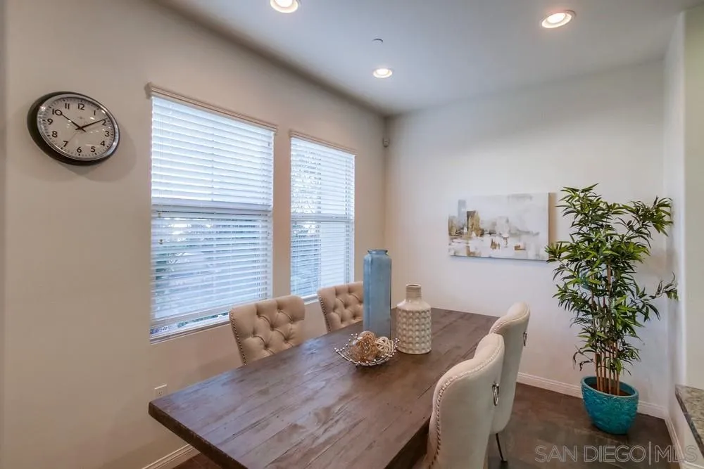 16629 Gill Loop San Diego, CA 92127 - Photo 11 of 25 a view of a dining room with furniture window and wooden floor