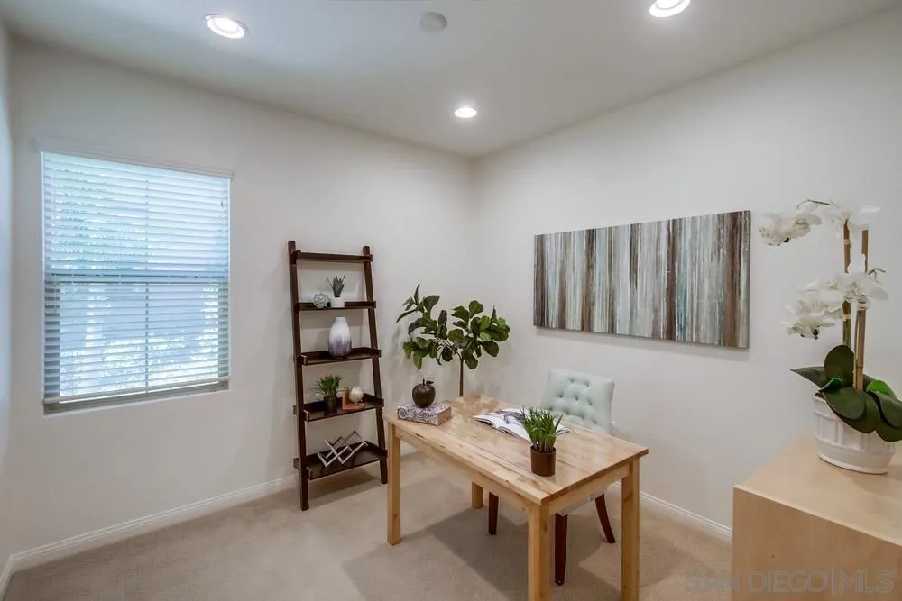 16629 Gill Loop San Diego, CA 92127 - Photo 13 of 25 a living room with furniture and a potted plant