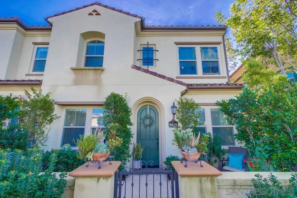 16629 Gill Loop San Diego, CA 92127 - Photo 2 of 25 a view of house with outdoor space and swimming pool