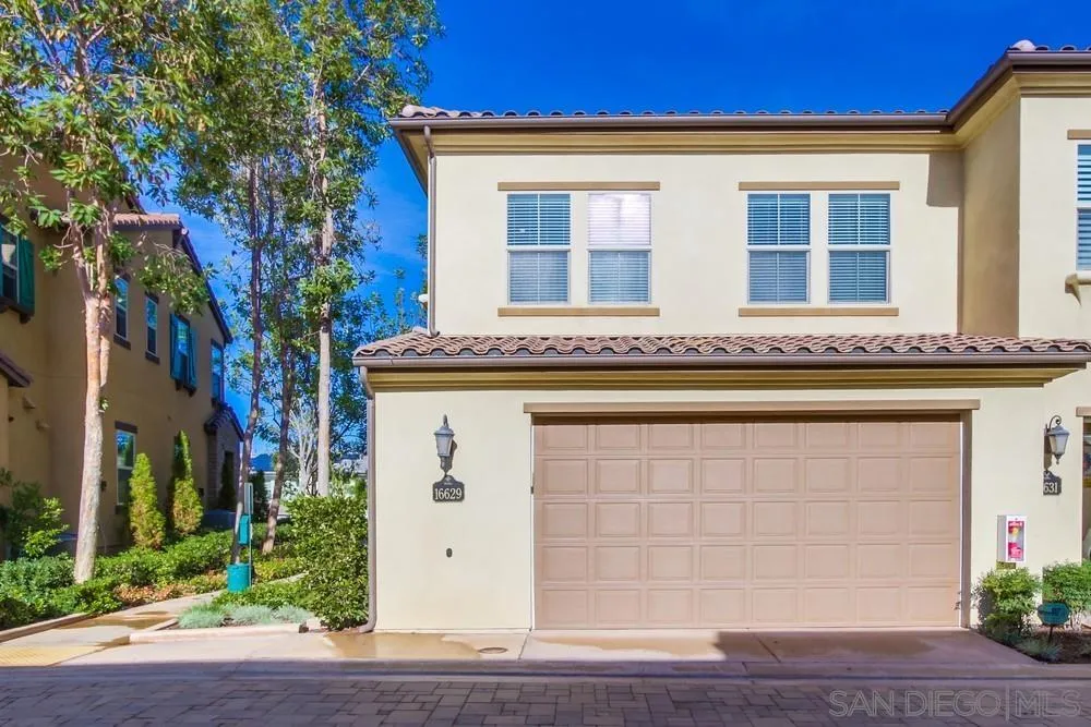 16629 Gill Loop San Diego, CA 92127 - Photo 22 of 25 a front view of a building with garden