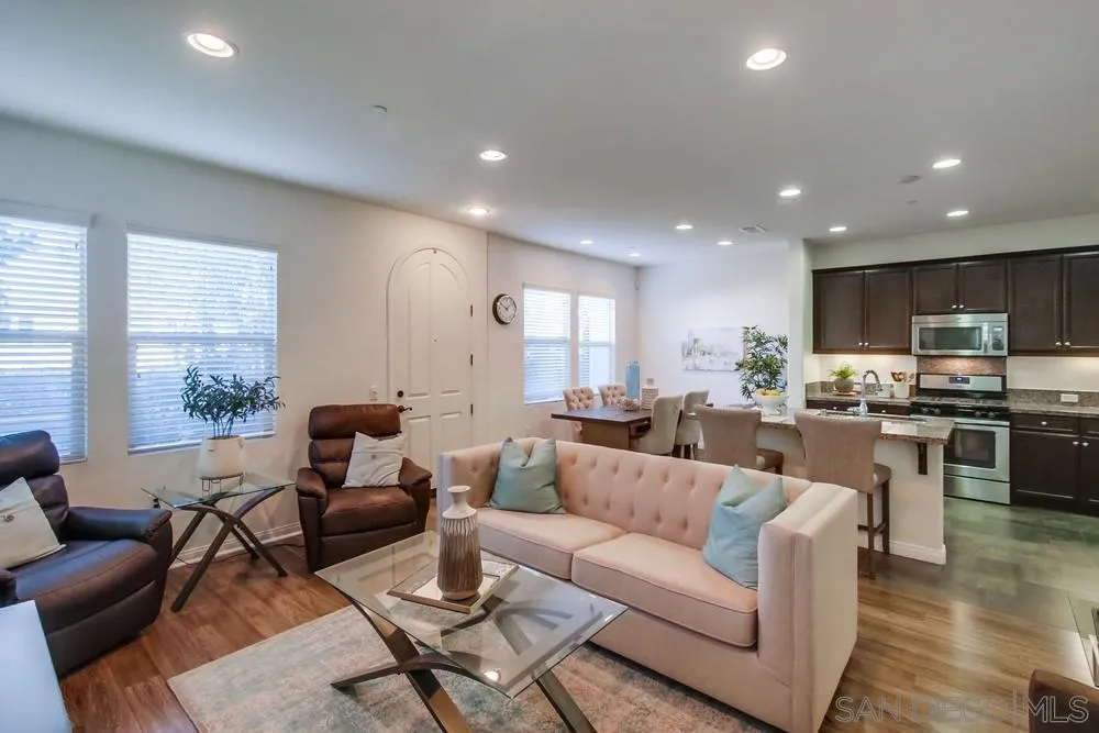 16629 Gill Loop San Diego, CA 92127 - Photo 5 of 25 a living room with furniture kitchen and a large window