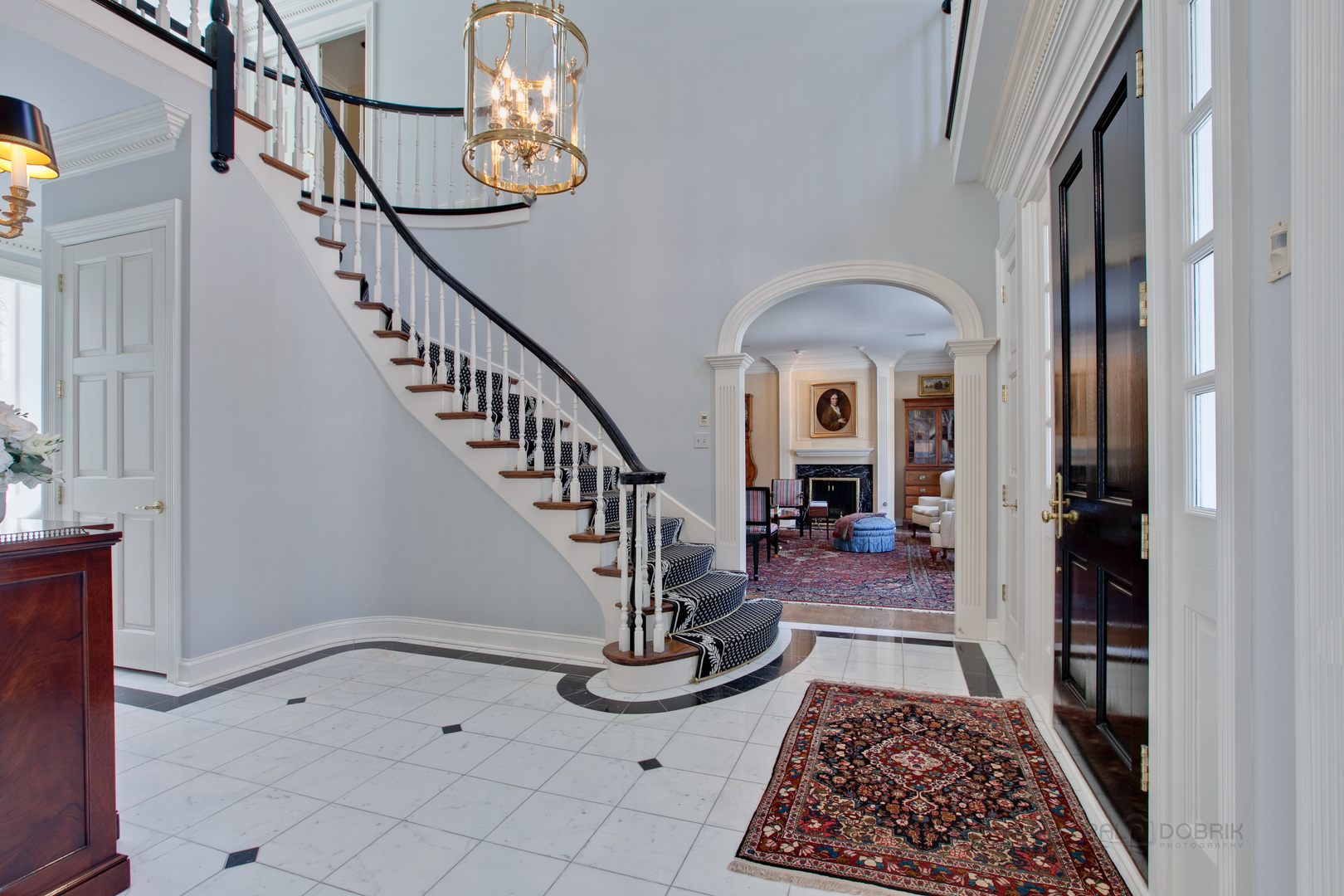 191 North Mayflower Road Lake Forest, IL 60045 - Photo 4 of 36 a view of entryway and hall with a rug