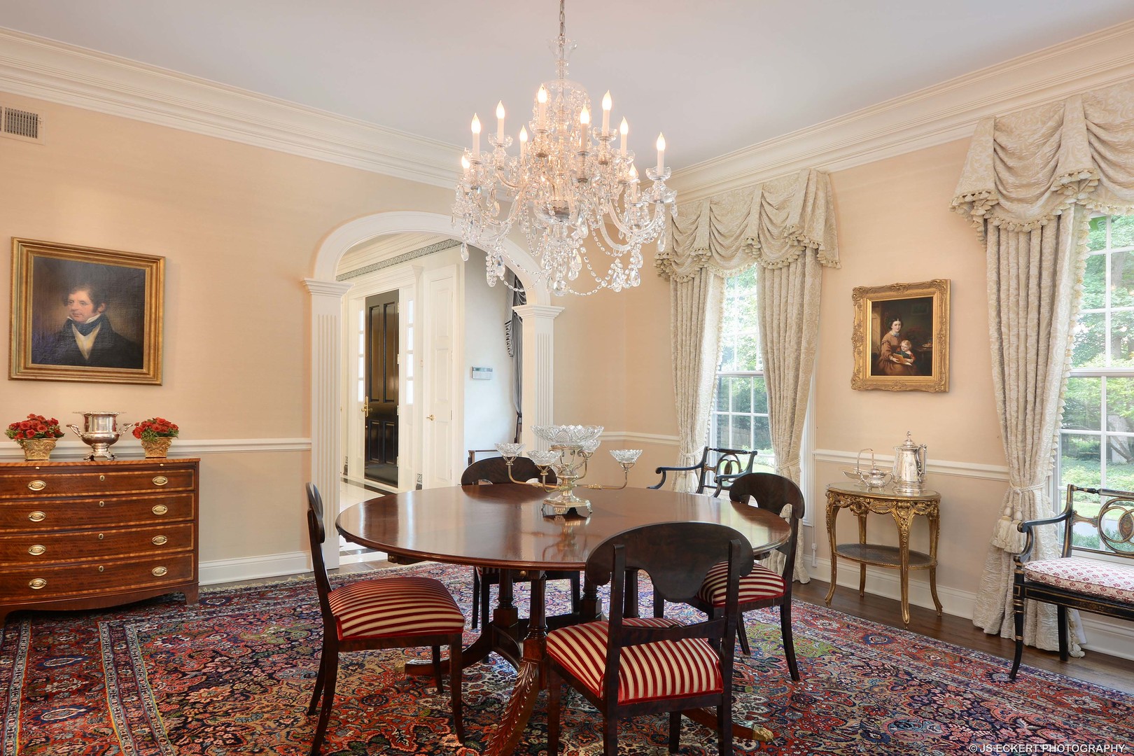 191 North Mayflower Road Lake Forest, IL 60045 - Photo 8 of 36 a view of a dining room with furniture and chandelier