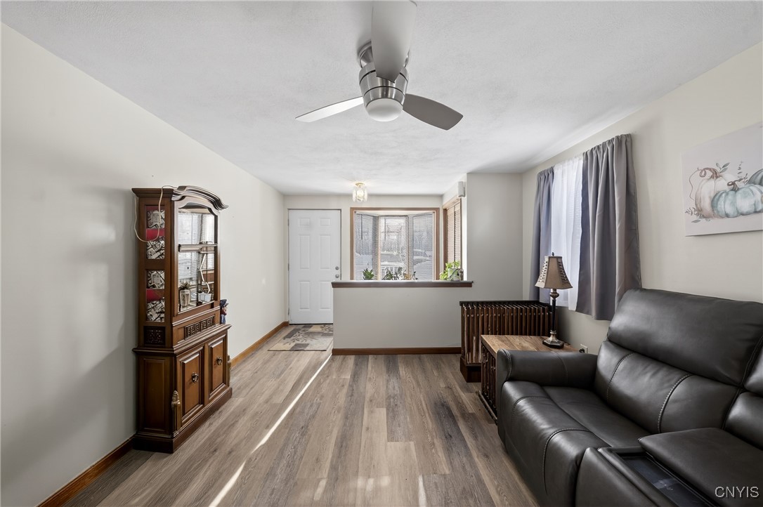 507 County Rte 12 Schroeppel, NY 13132 - Photo 11 of 50 Main living room view, looking out to the front of
