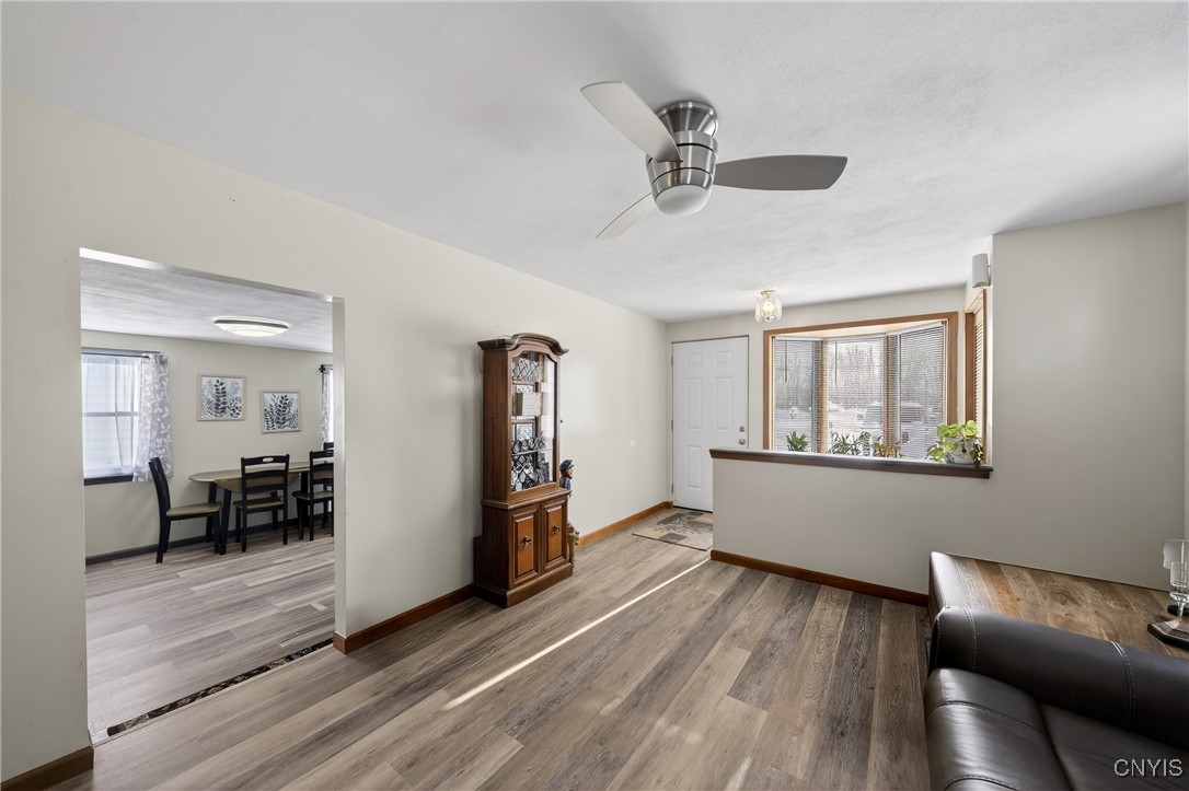 507 County Rte 12 Schroeppel, NY 13132 - Photo 13 of 50 Living room looking into the dining/kitchen combo.