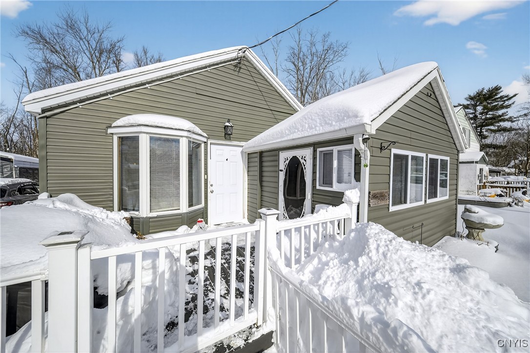 507 County Rte 12 Schroeppel, NY 13132 - Photo 5 of 50 Front deck plus a heated enclosed porch/sunroom to