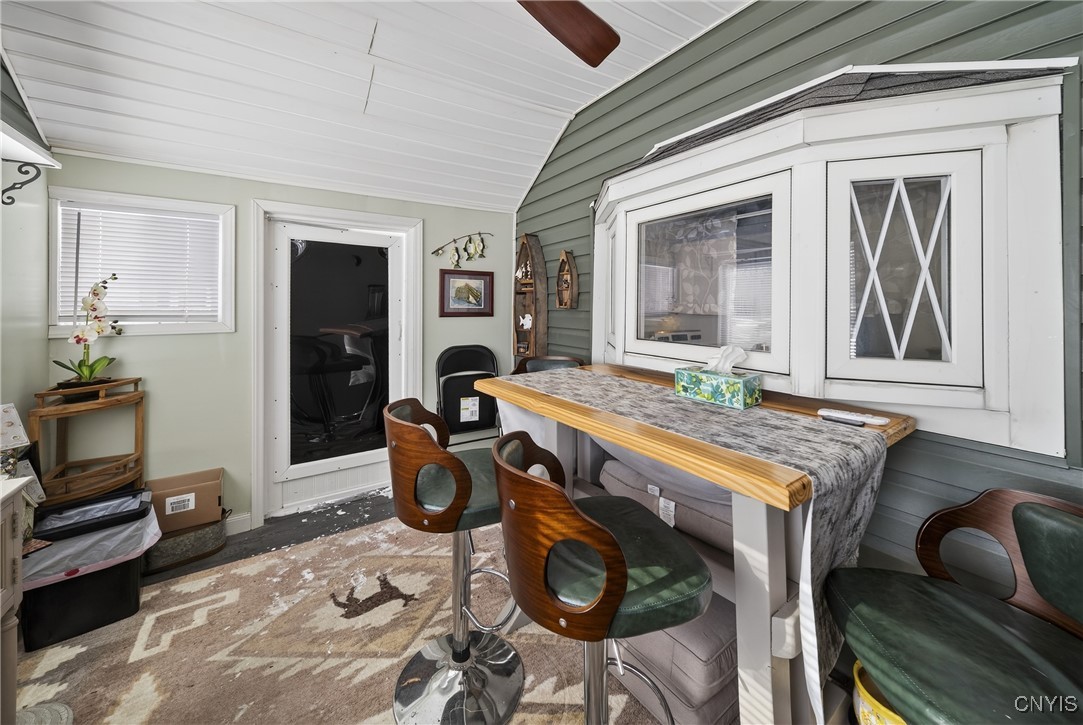 507 County Rte 12 Schroeppel, NY 13132 - Photo 7 of 50 Front sunroom, window looks into the kitchen.