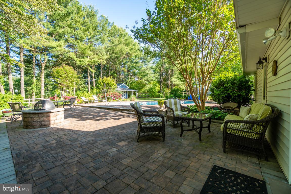 4211 High Ridge Road Haymarket, VA 20169 - Photo 7 of 50 Fire Pit and pavers surround.