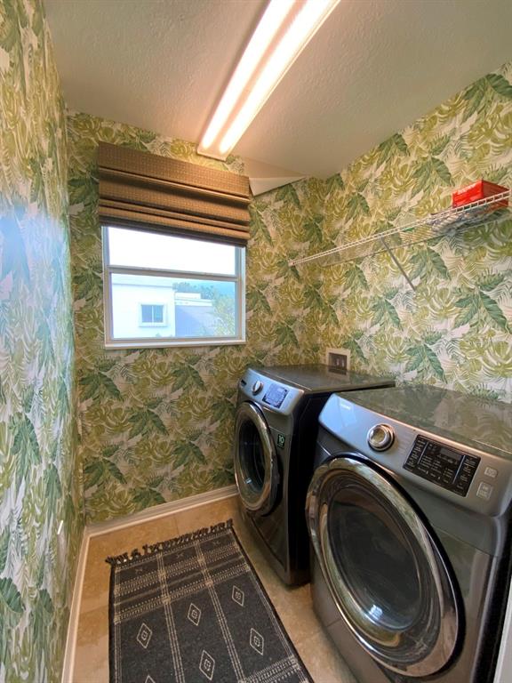 809 North Oregon Avenue Tampa, FL 33606 - Photo 13 of 16 a utility room with dryer and washer