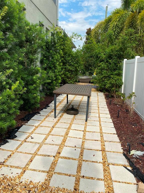809 North Oregon Avenue Tampa, FL 33606 - Photo 15 of 16 a view of backyard with plants and trees