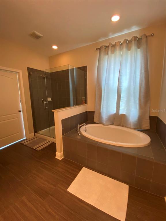 809 North Oregon Avenue Tampa, FL 33606 - Photo 8 of 16 a bathroom with a sink and a mirror