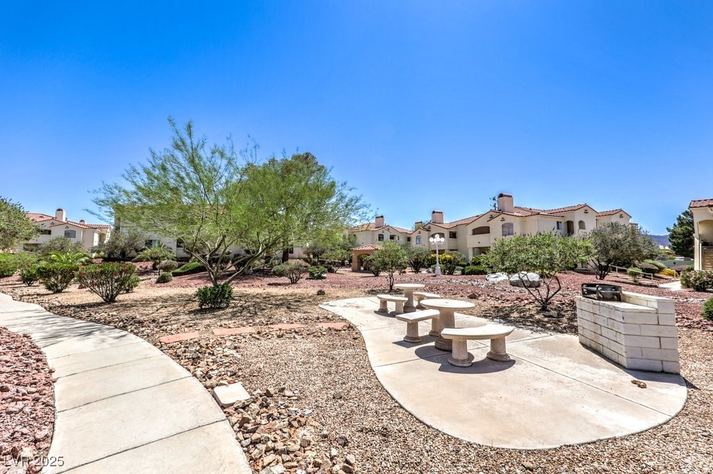 698 South Racetrack Road, Unit 1014 Henderson, NV 89015 - Photo 25 of 25 View of community with a patio area and a residential view