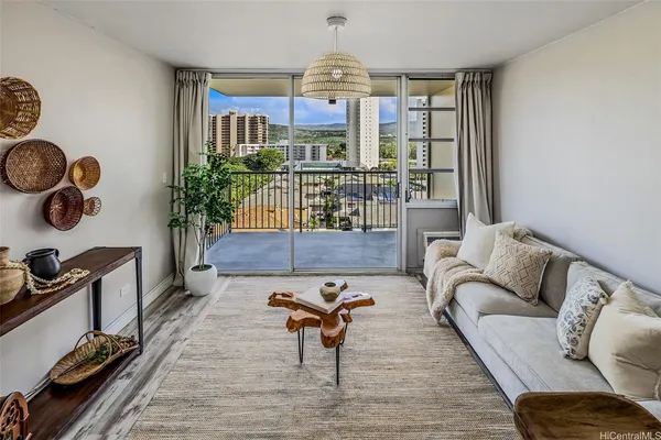 a living room with furniture and a window