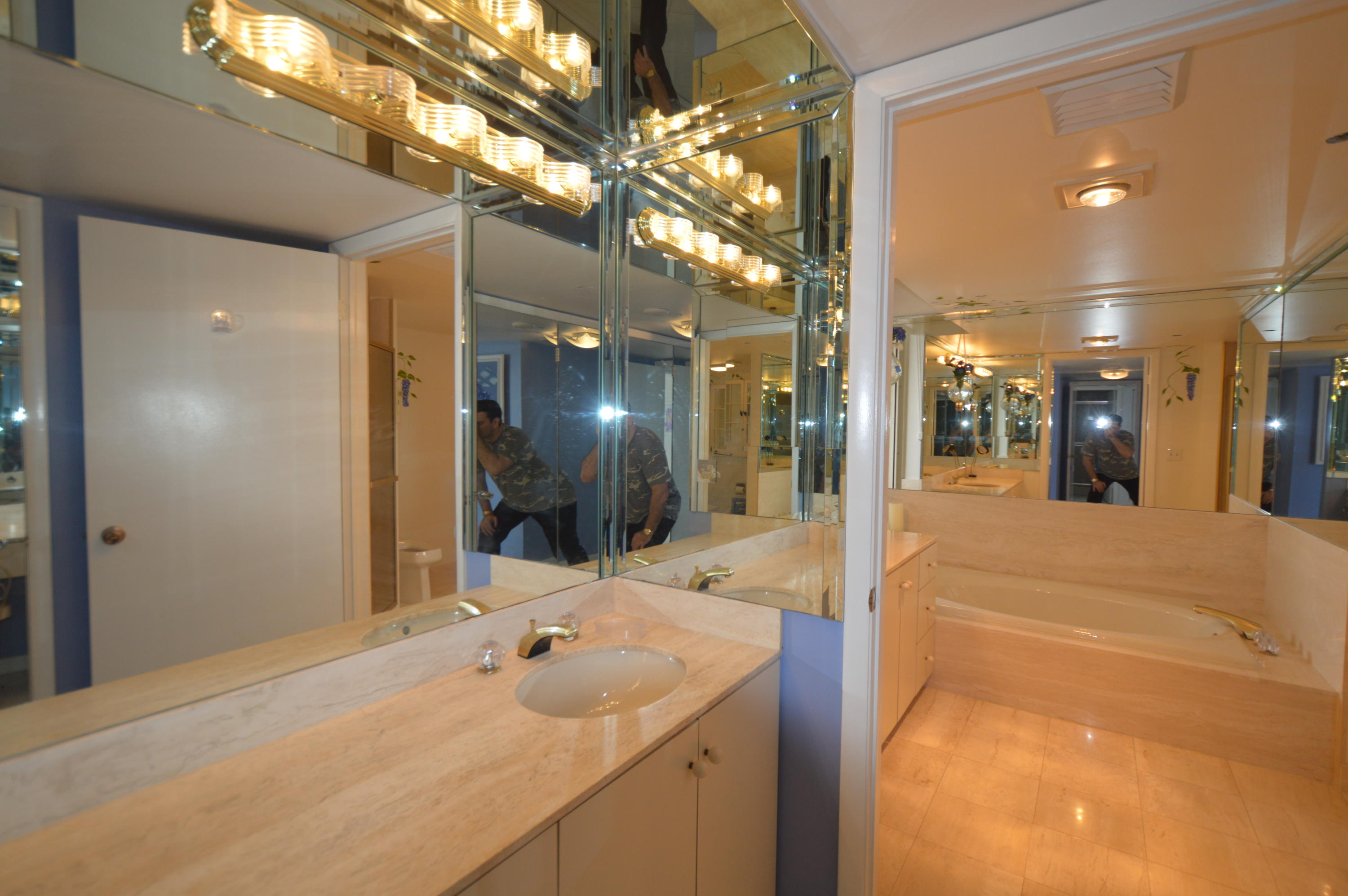 4201 North Ocean Boulevard, Unit C1001 Boca Raton, FL 33431 - Photo 28 of 48 Master Bath/ Sitting Area