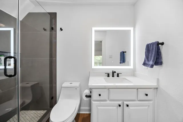 a view of a swimming pool with an outdoor space and seating area