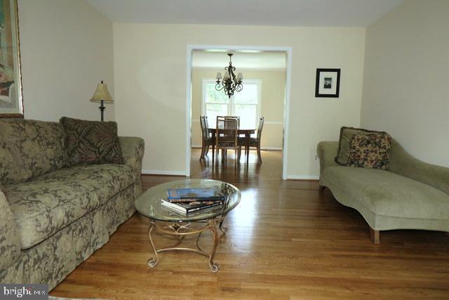 9444 Reach Road Potomac, MD 20854 - Photo 7 of 41 Living Room looking into Dining Room