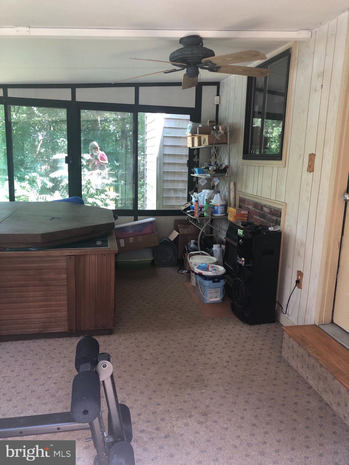 1260 County Rte 1/1 Berkeley Springs, WV 25411 - Photo 20 of 29 Sun Room with hot tub