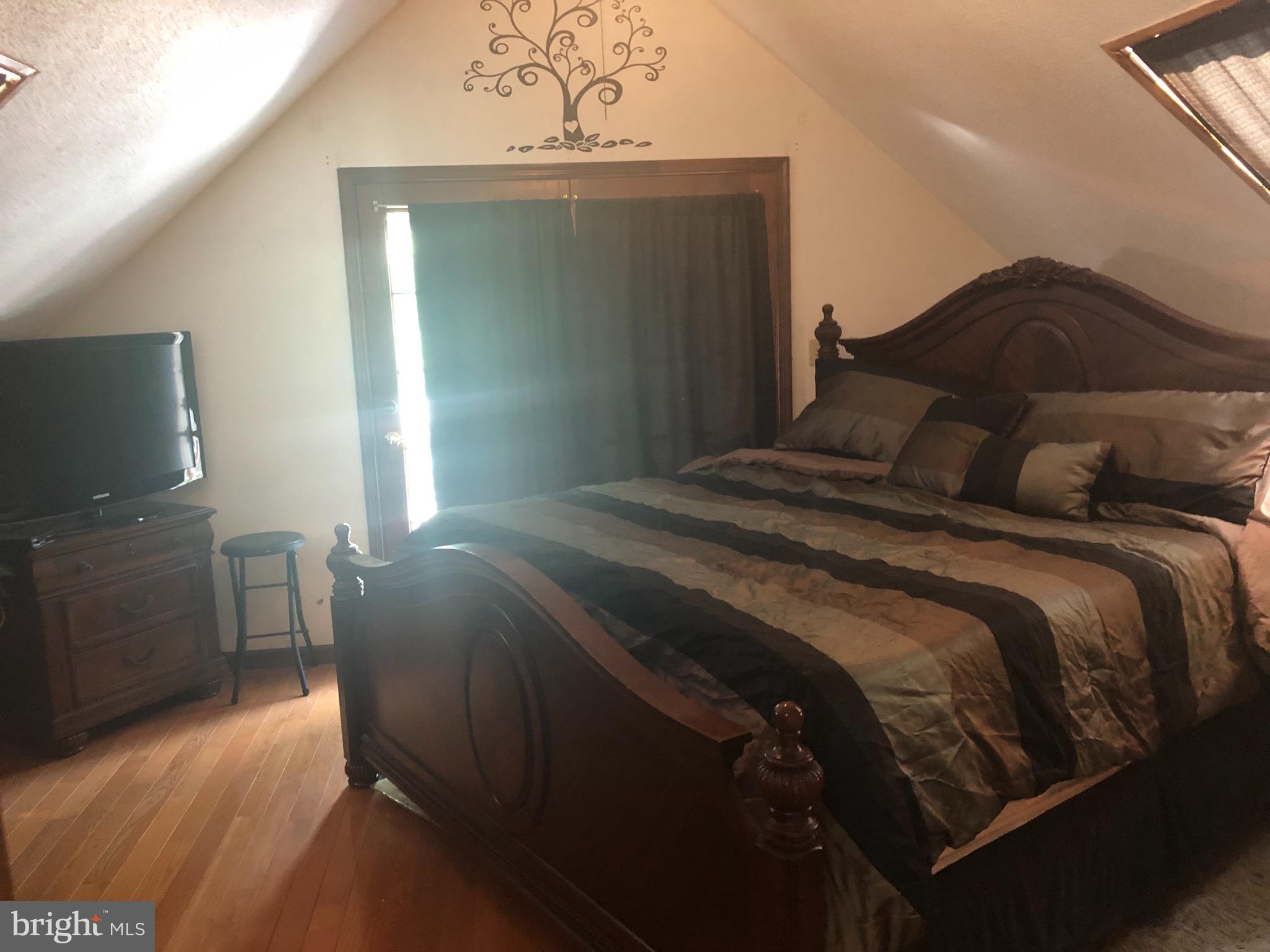 1260 County Rte 1/1 Berkeley Springs, WV 25411 - Photo 21 of 29 Master Bedroom