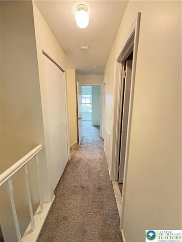 a bathroom with a sink a toilet and bathtub