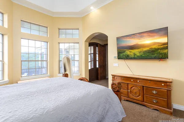 a large kitchen with a large window