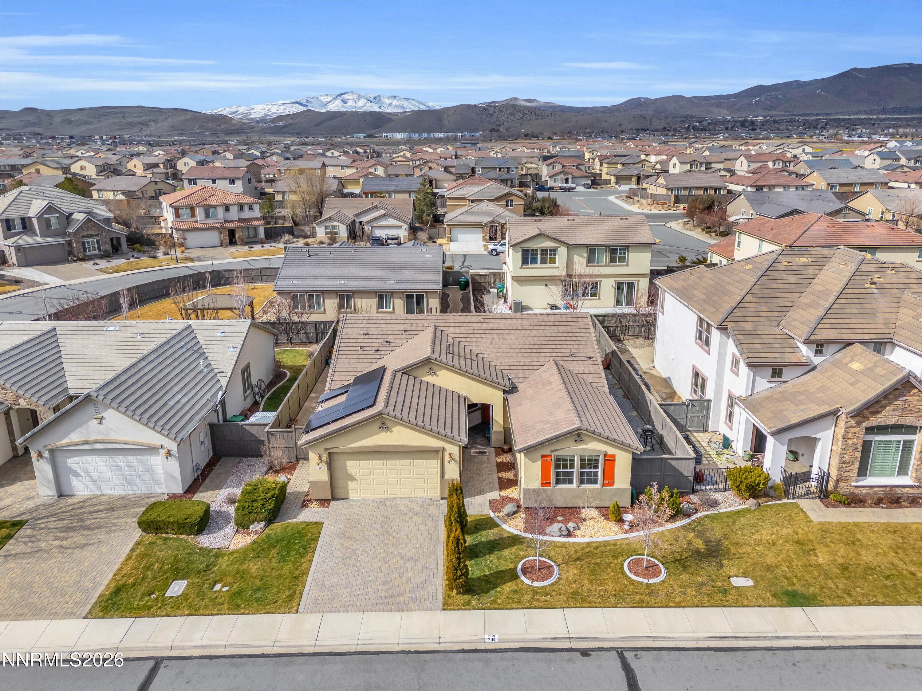 7119 Coldwater Street Sparks, NV 89436 - Photo 1 of 45 an aerial view of residential houses with outdoor space and parking