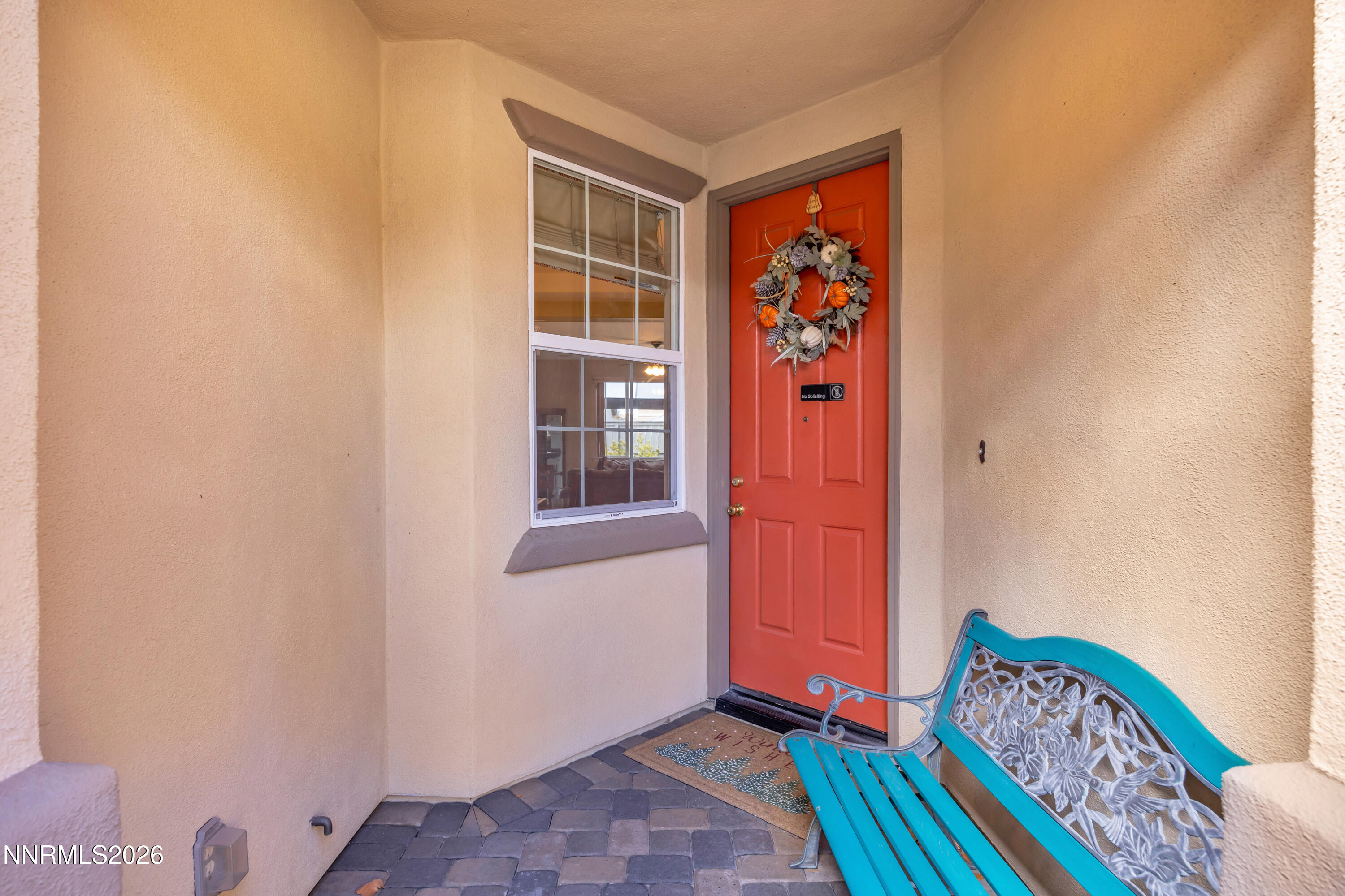 7119 Coldwater Street Sparks, NV 89436 - Photo 16 of 45 a bedroom with a bed and a window
