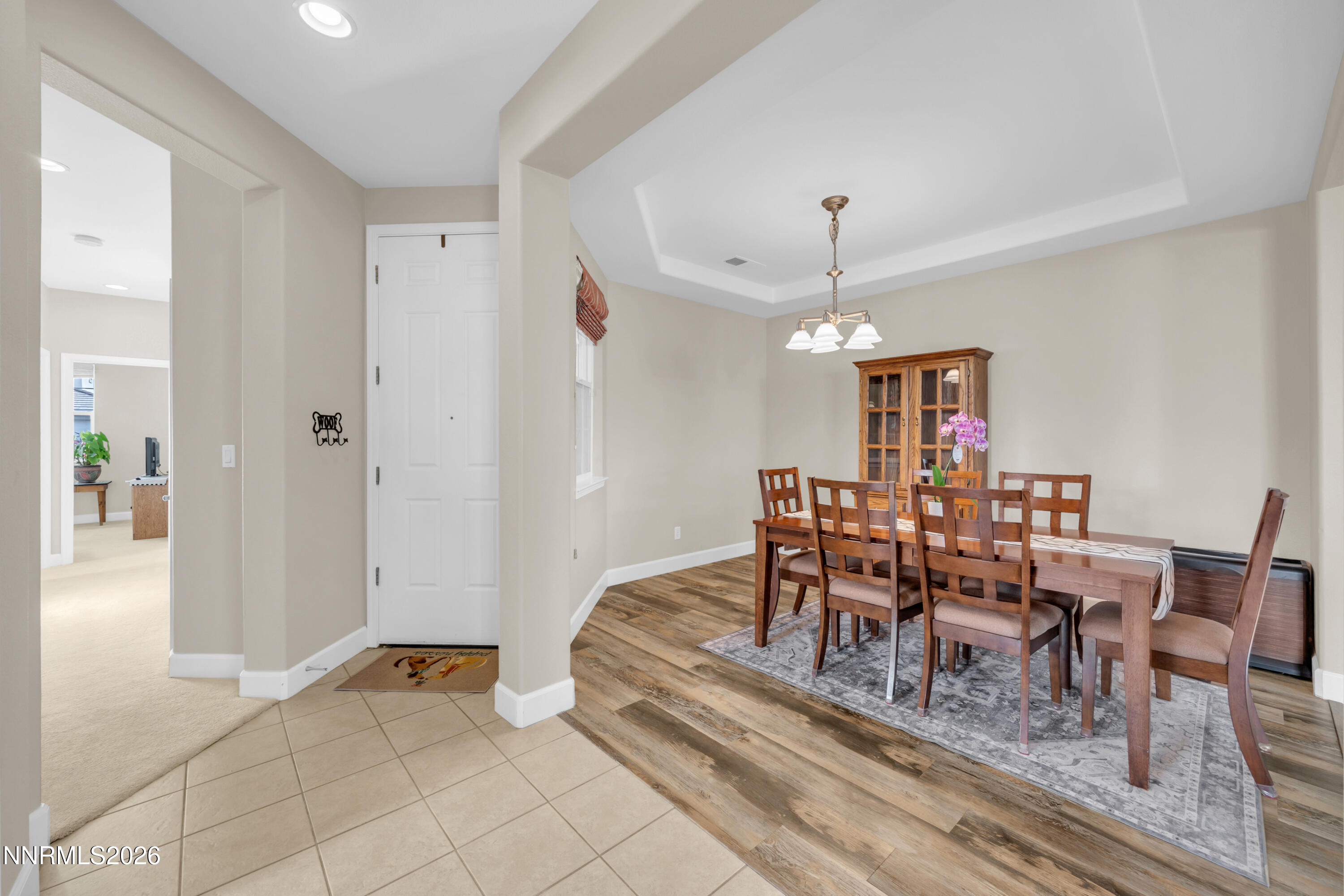 7119 Coldwater Street Sparks, NV 89436 - Photo 18 of 45 a dining room with furniture window and wooden floor