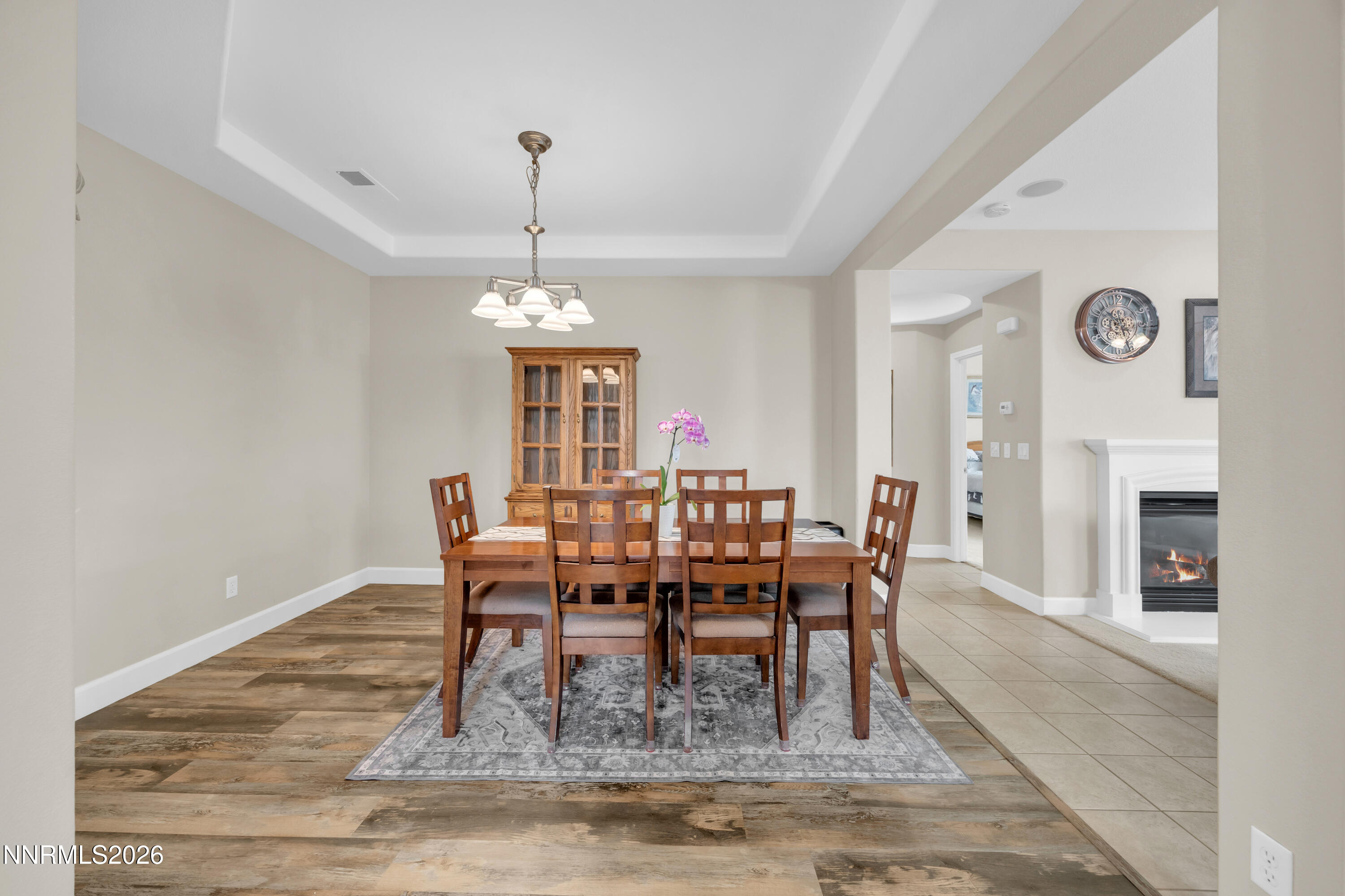 7119 Coldwater Street Sparks, NV 89436 - Photo 19 of 45 a dining room with furniture window and wooden floor