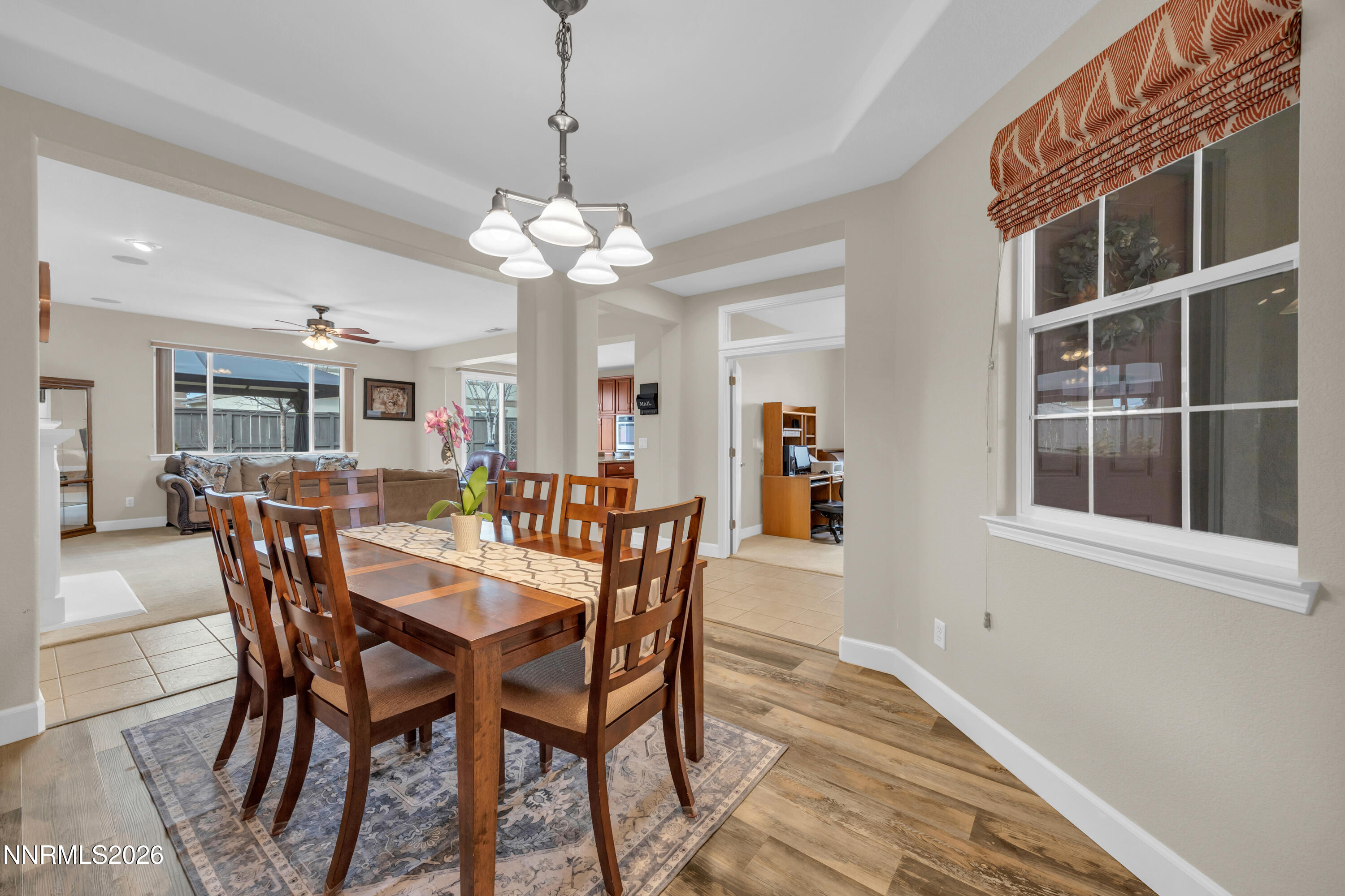 7119 Coldwater Street Sparks, NV 89436 - Photo 20 of 45 a view of a dining room with furniture and chandelier