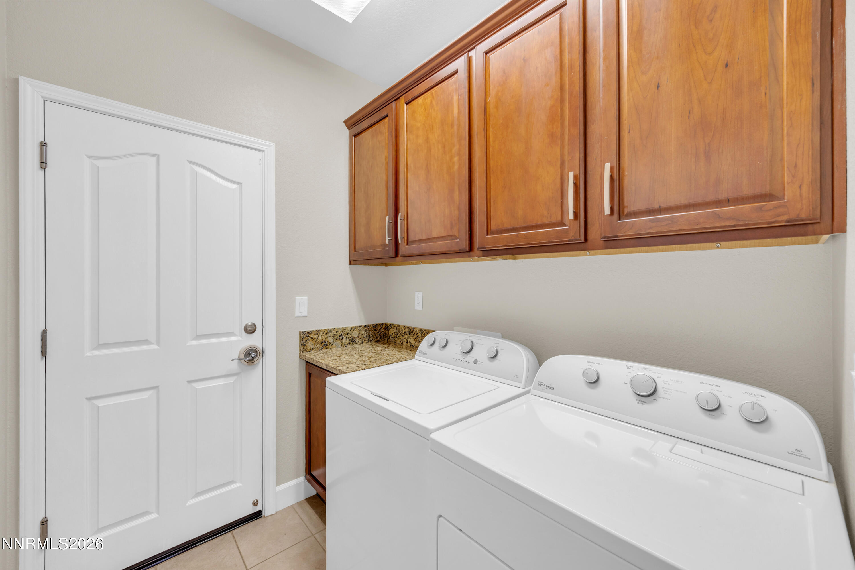 7119 Coldwater Street Sparks, NV 89436 - Photo 39 of 45 a utility room with dryer and washer