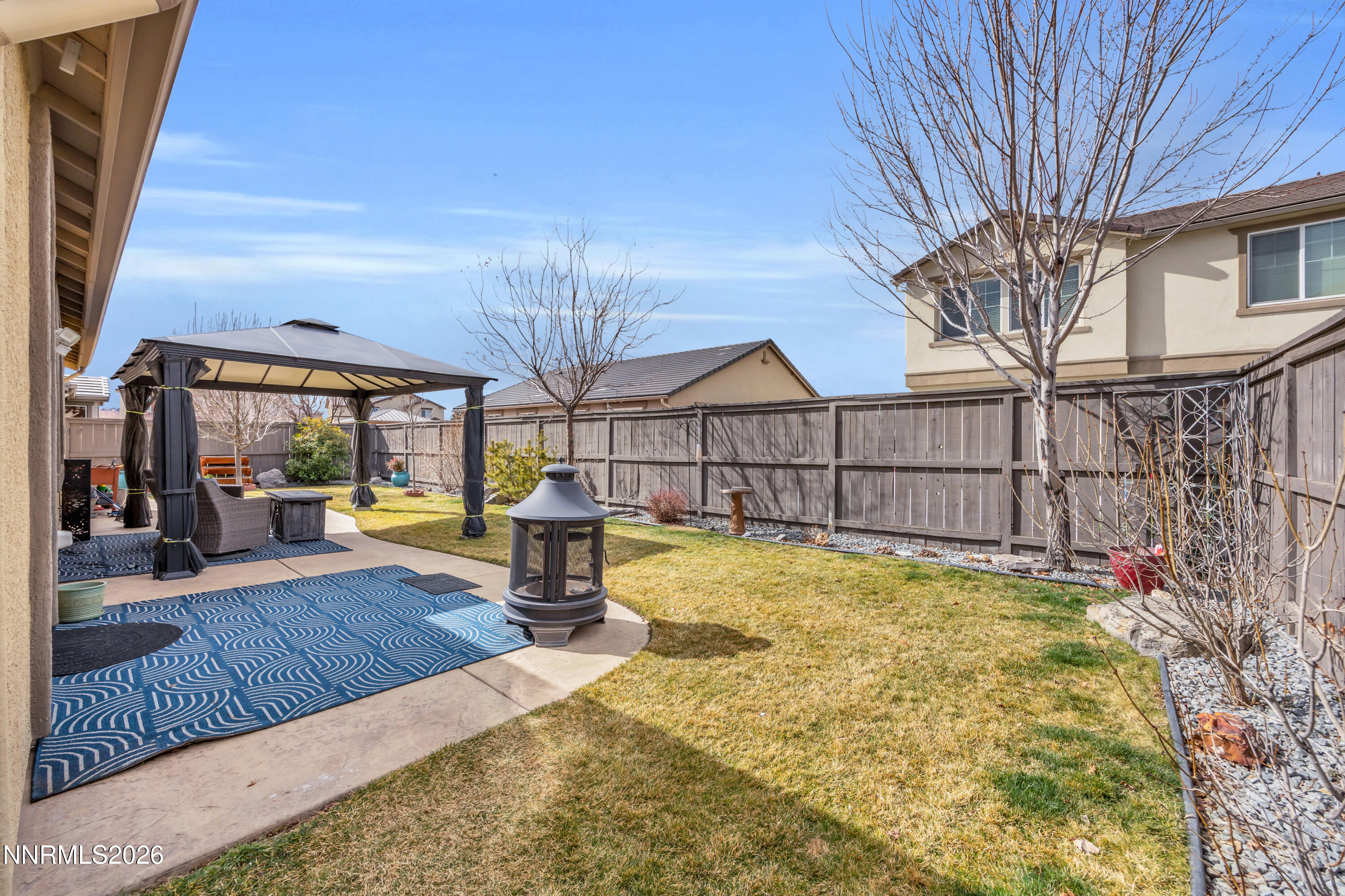 7119 Coldwater Street Sparks, NV 89436 - Photo 40 of 45 a view of a house with swimming pool and sitting area