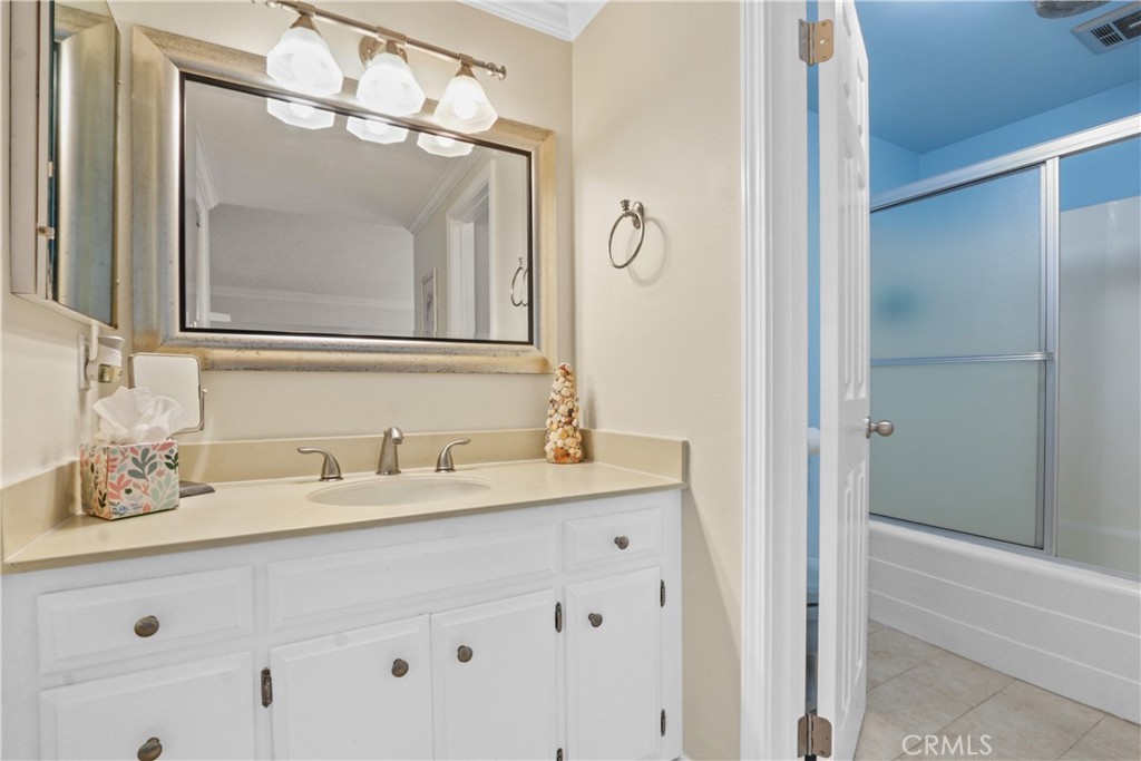 215 Valley Drive Hermosa Beach, CA 90254 - Photo 13 of 27 a bathroom with a double vanity sink mirror and