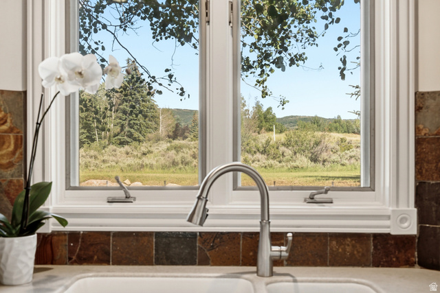 3535 Homestead Road Park City, UT 84098 - Photo 17 of 81 Double-hung window overlooking a natural landscape with distant hills