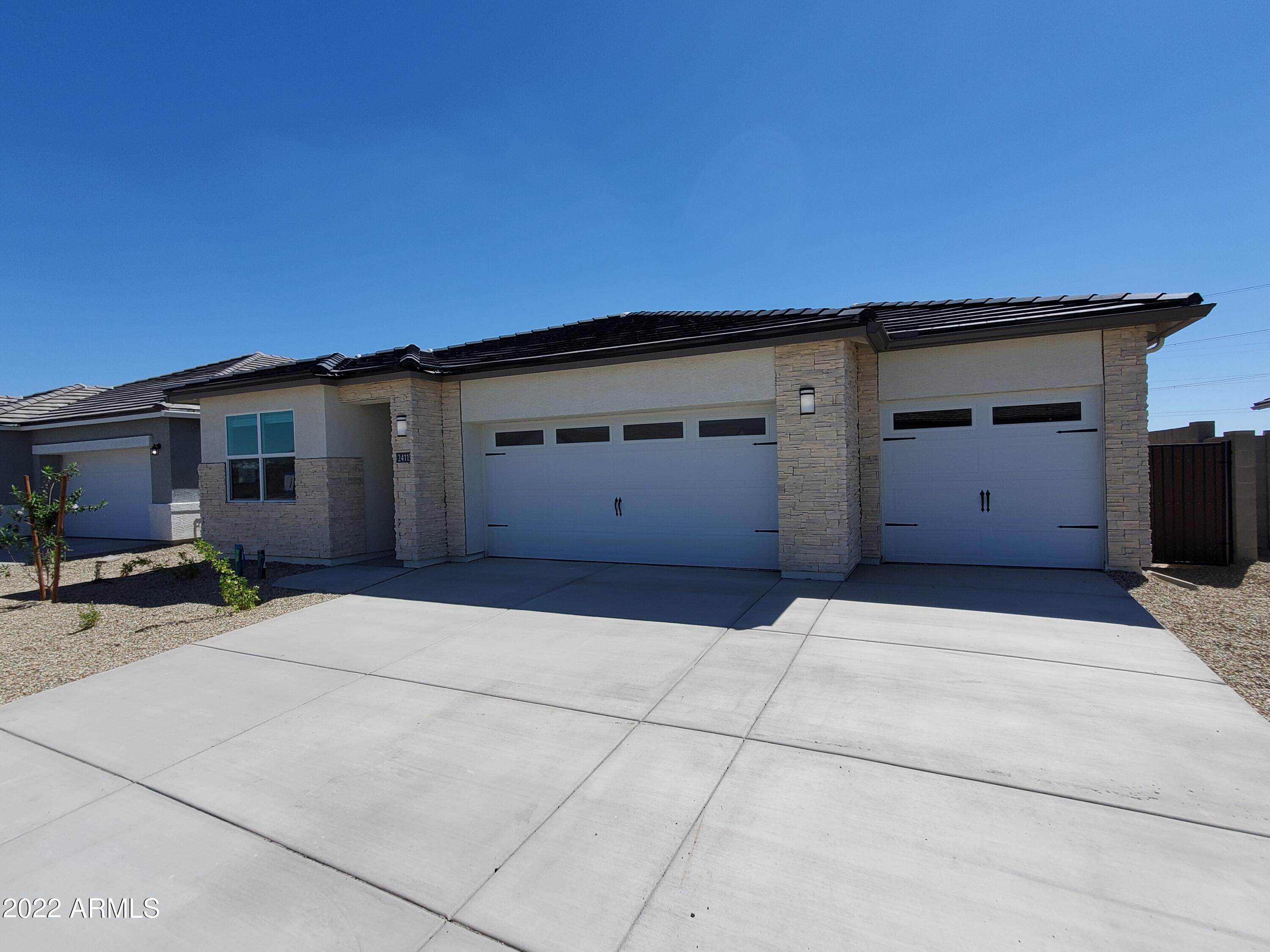 24115 West Ripple Road Buckeye, AZ 85326 - Photo 2 of 37 12 garage