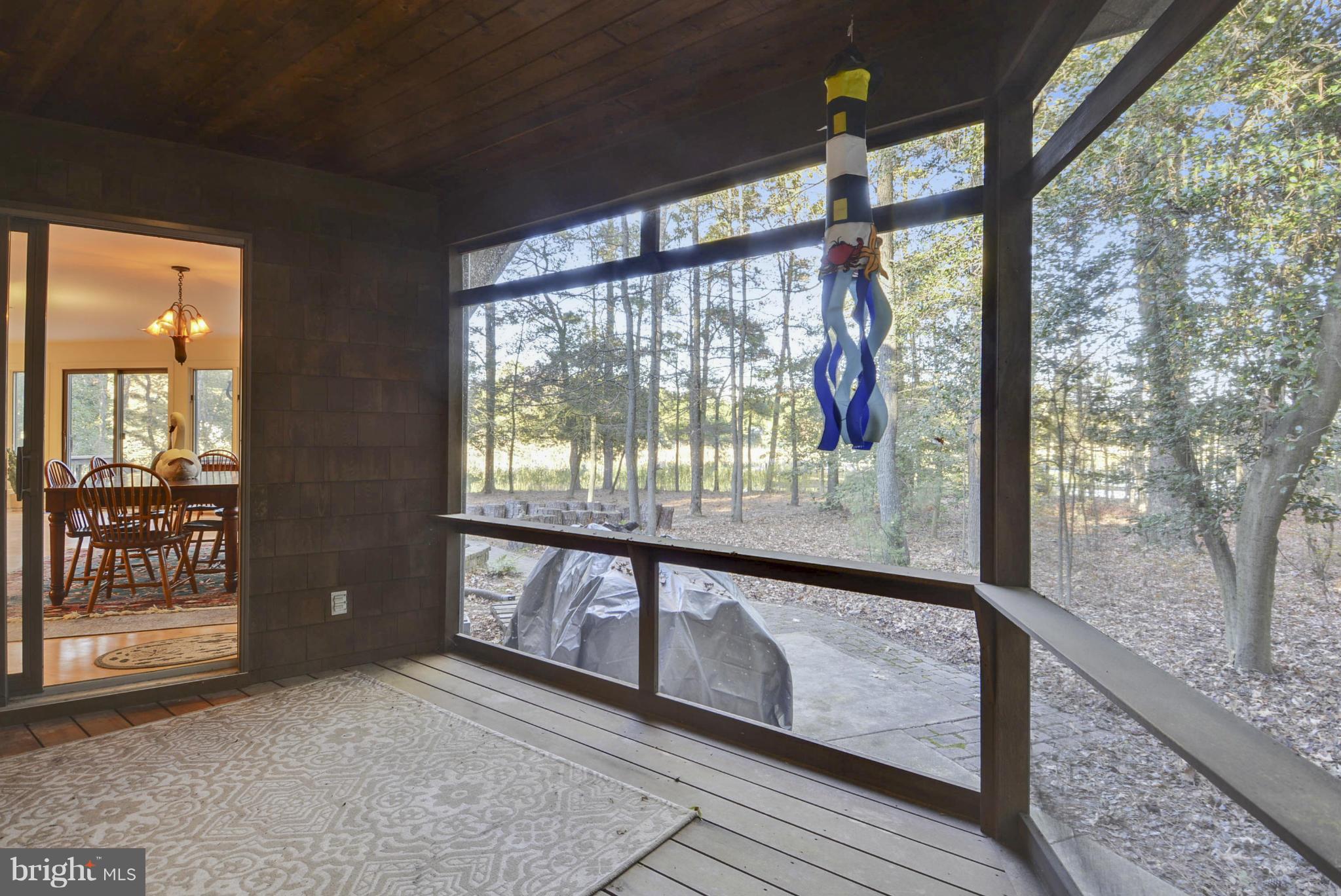 8011 Church Neck Road St. Michaels, MD 21663 - Photo 22 of 28 Screened Porch off Dining Room
