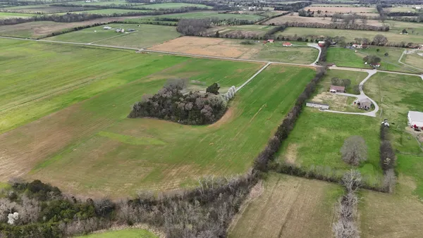a view of a golf course with a lake