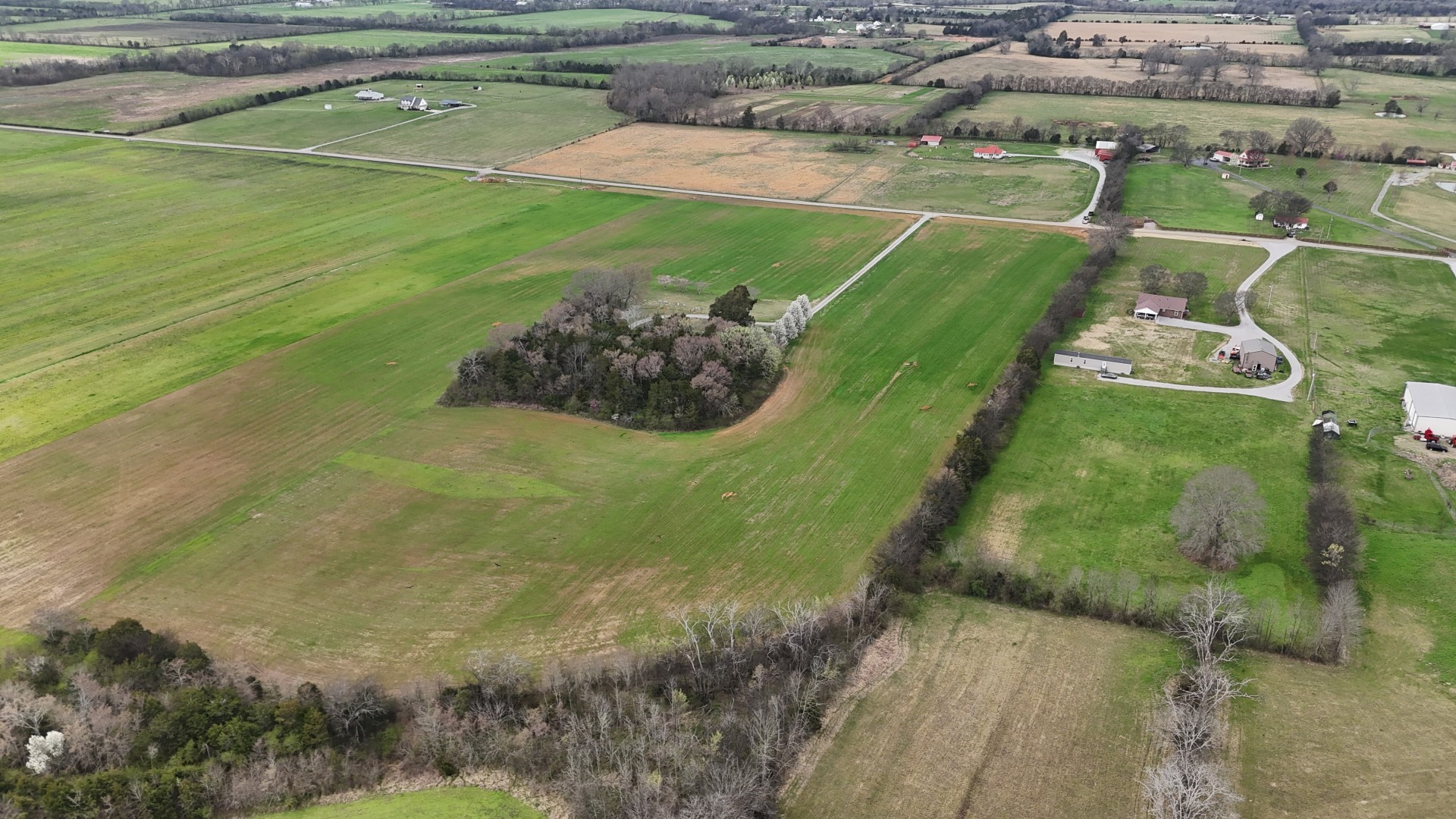 a view of a golf course with a lake