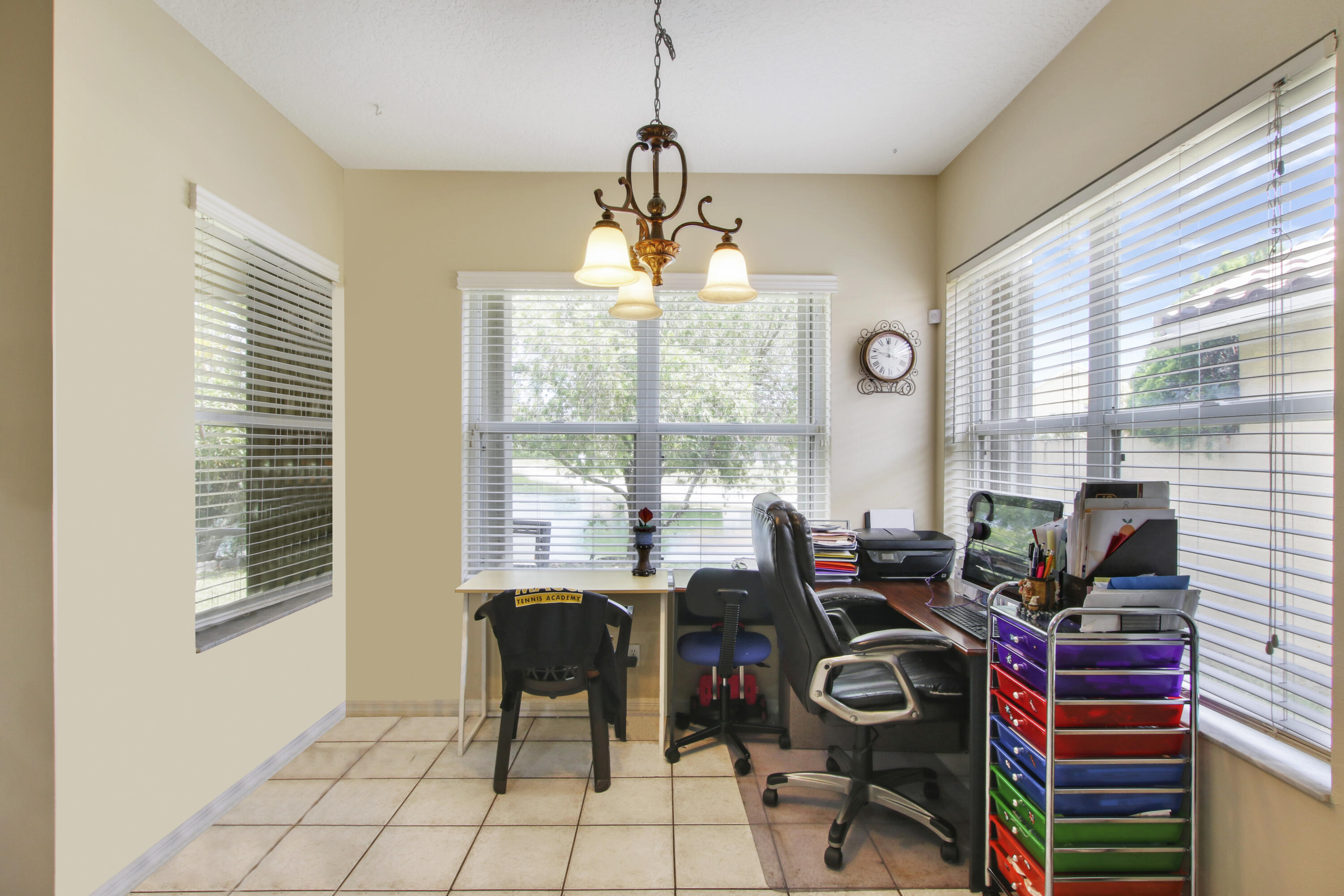 22048 Altona Drive Boca Raton, FL 33428 - Photo 13 of 33 a view of a workspace with furniture and a window