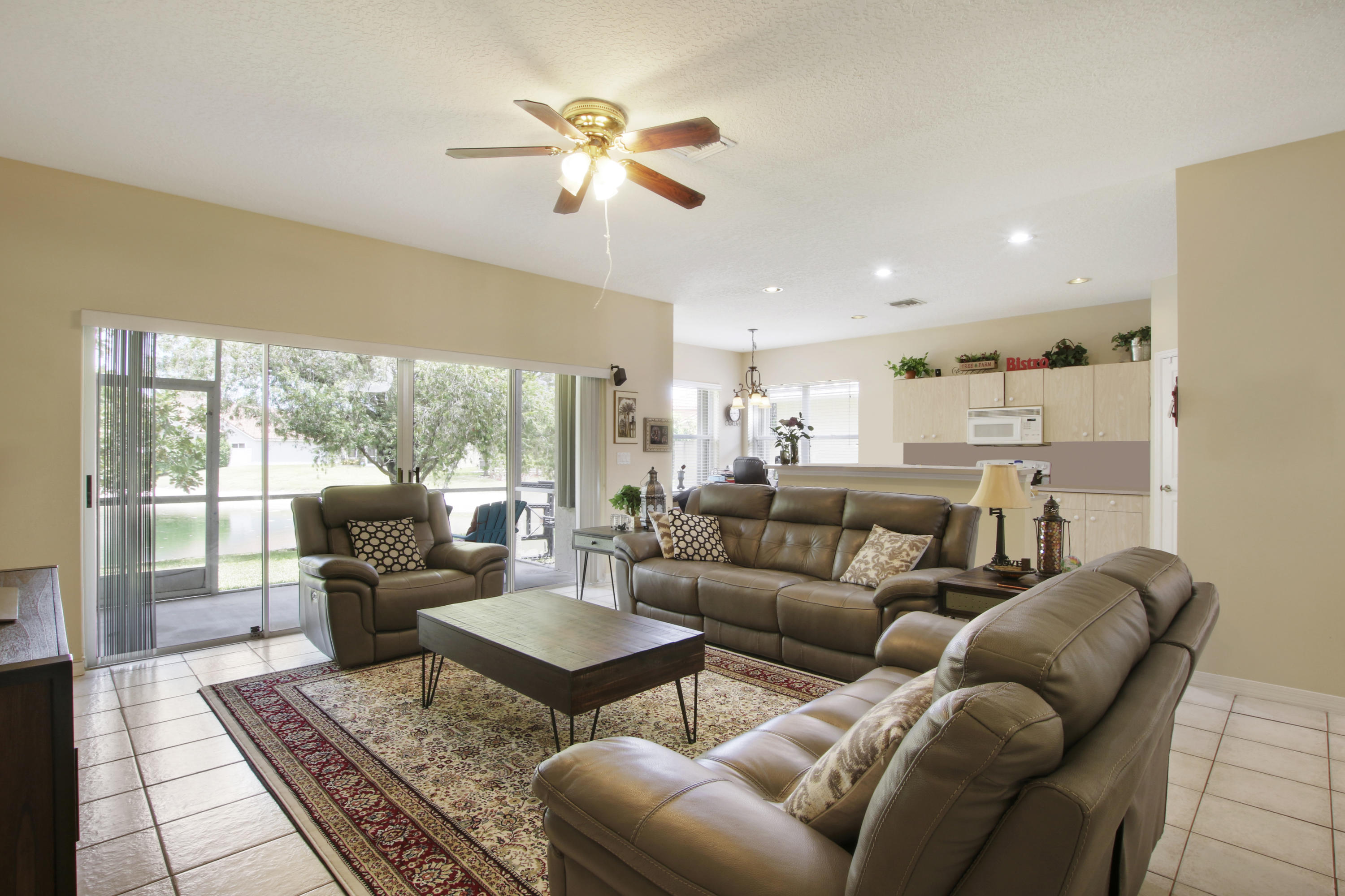 22048 Altona Drive Boca Raton, FL 33428 - Photo 15 of 33 a living room with furniture and a large window