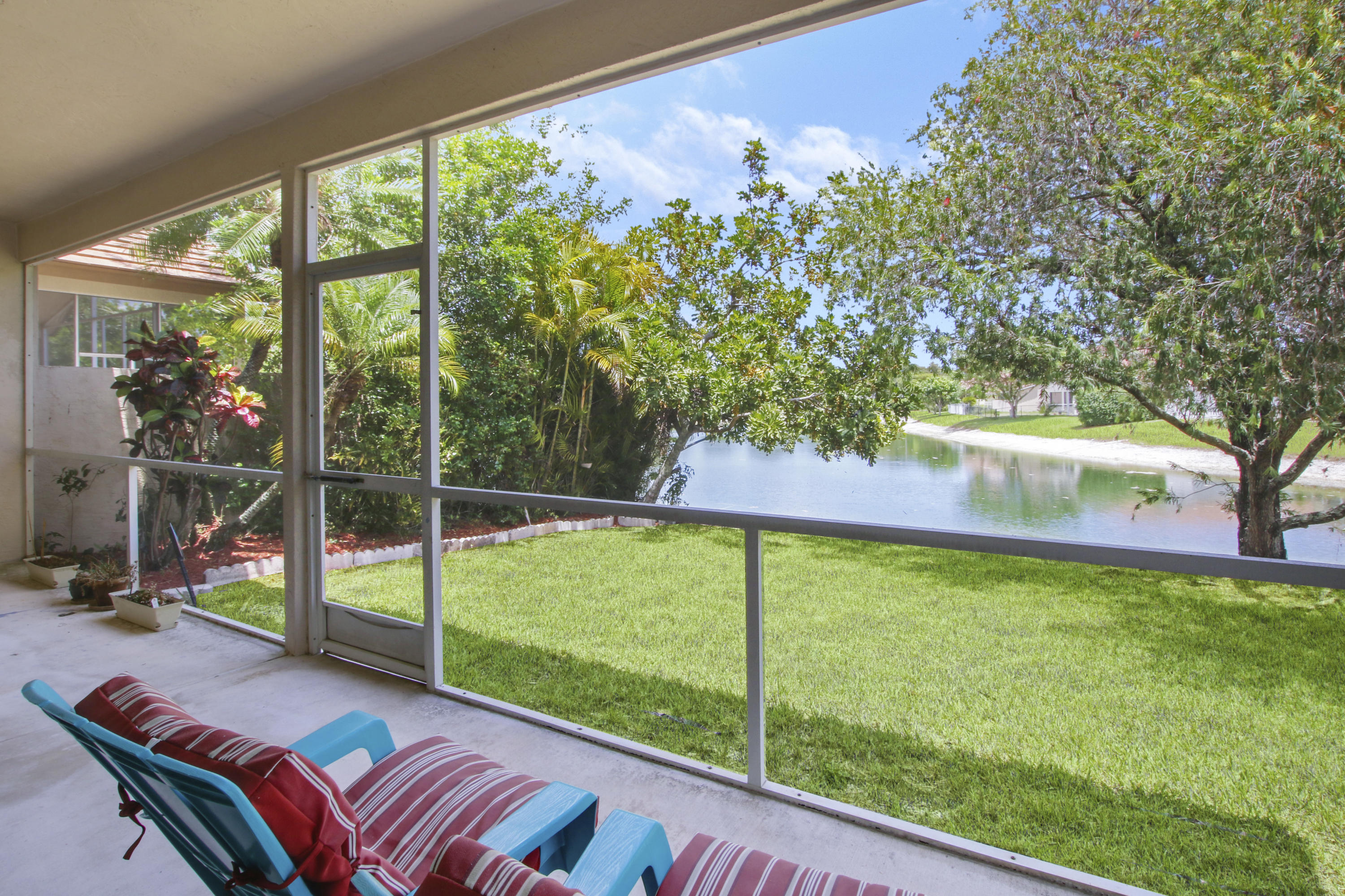 22048 Altona Drive Boca Raton, FL 33428 - Photo 27 of 33 a view of a garden from deck
