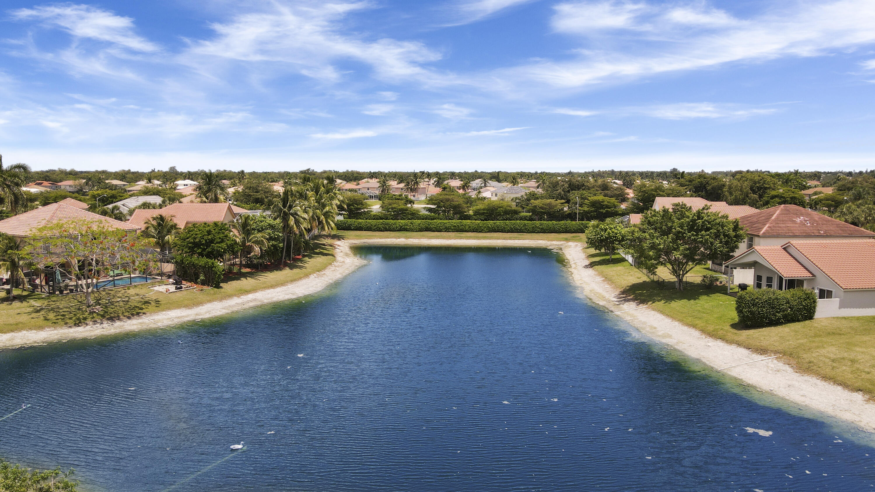 22048 Altona Drive Boca Raton, FL 33428 - Photo 31 of 33 a view of a lake with a mountain