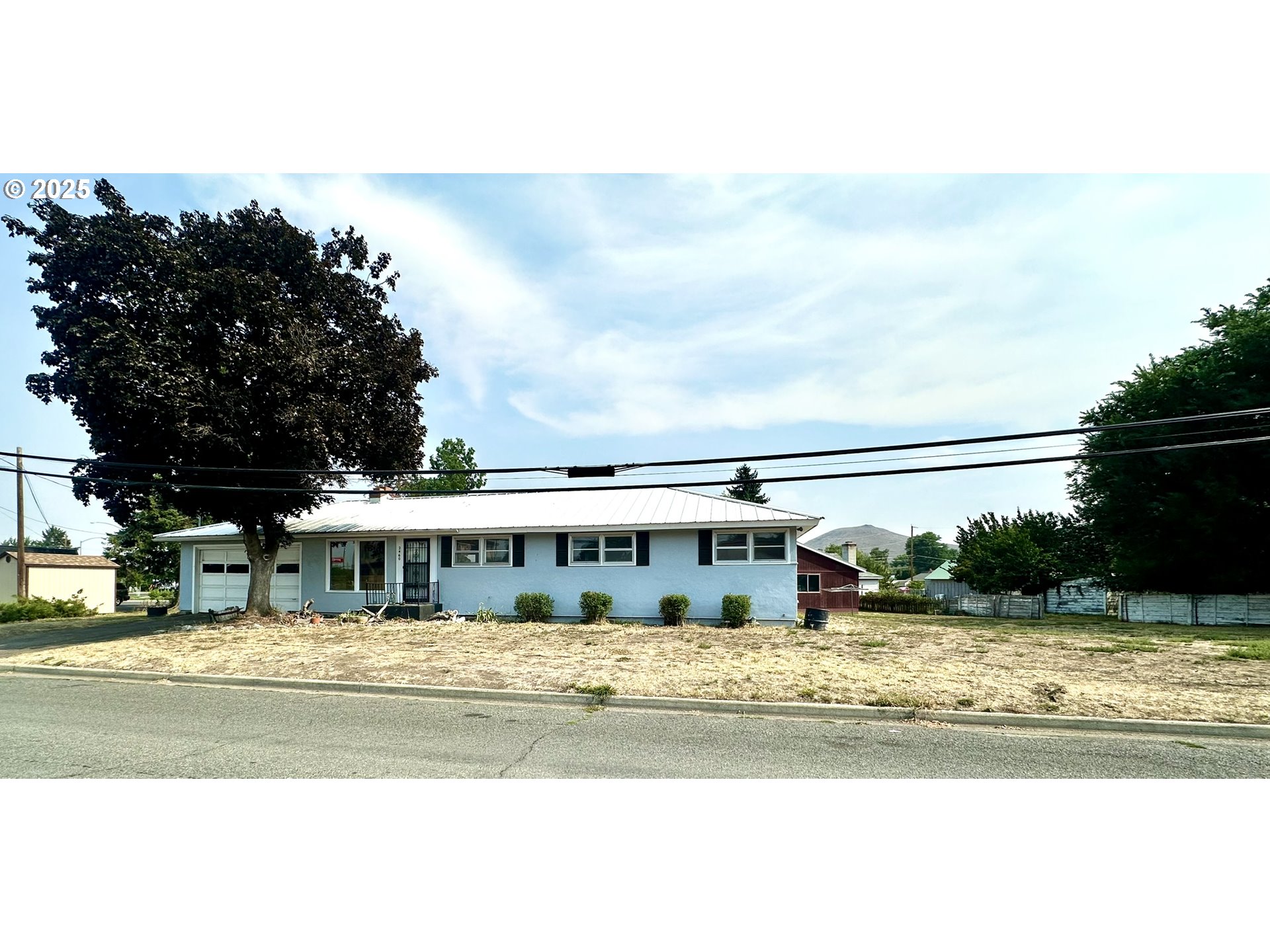 a view of swimming pool and a yard